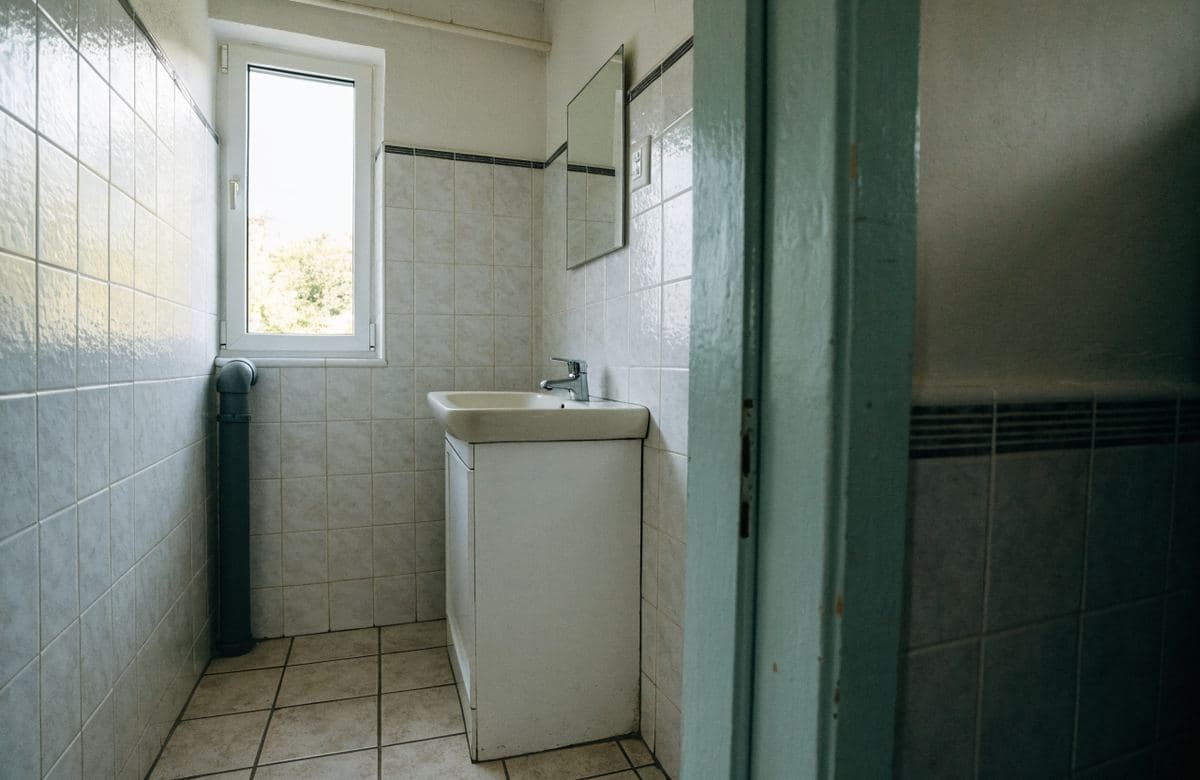 Illustrative clean renovated rental bathroom