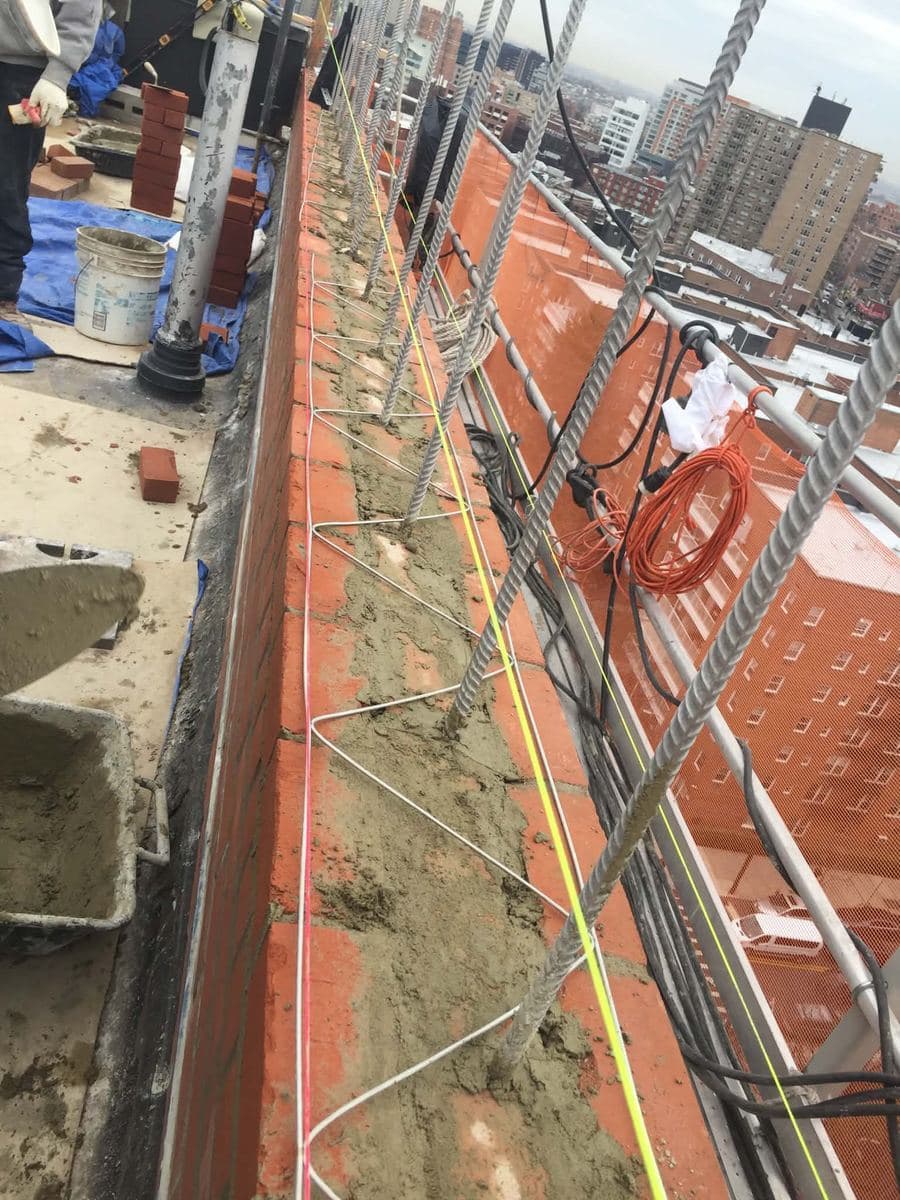 Broken concrete being removed from a street work area