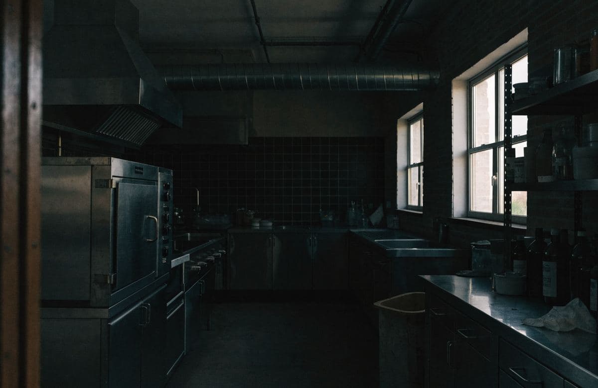 Illustrative dim kitchen with poor lighting