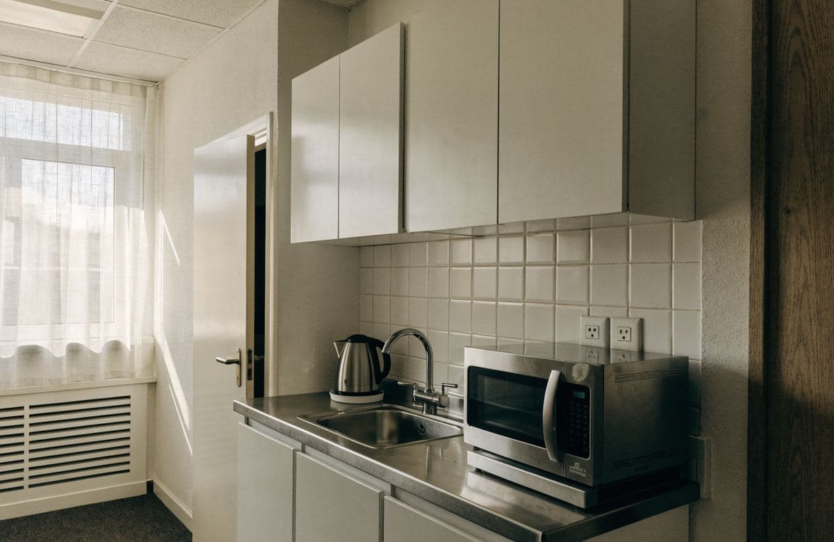 Illustrative small commercial break-room kitchenette