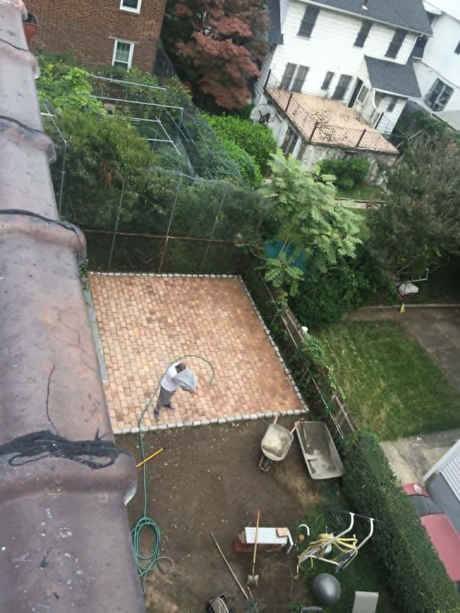 Rooftop brick work with a protective membrane against water