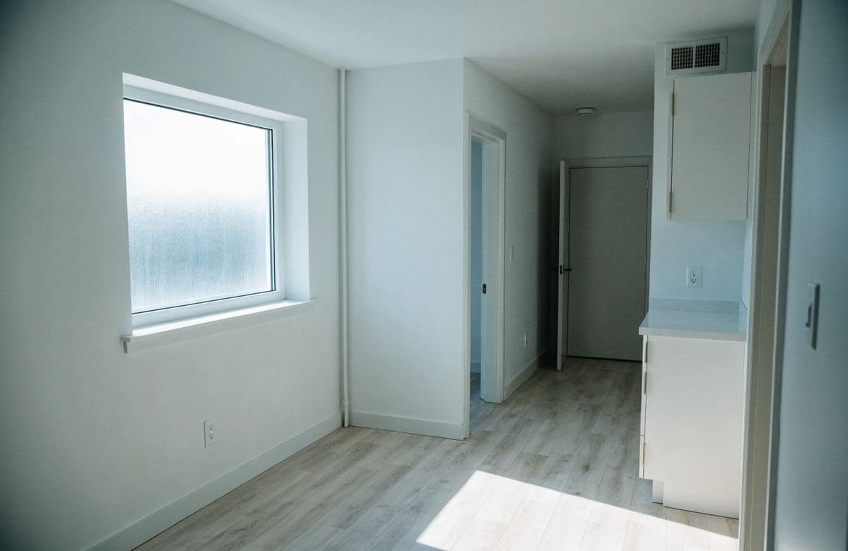 Illustrative freshly painted empty rental unit ready for tenants