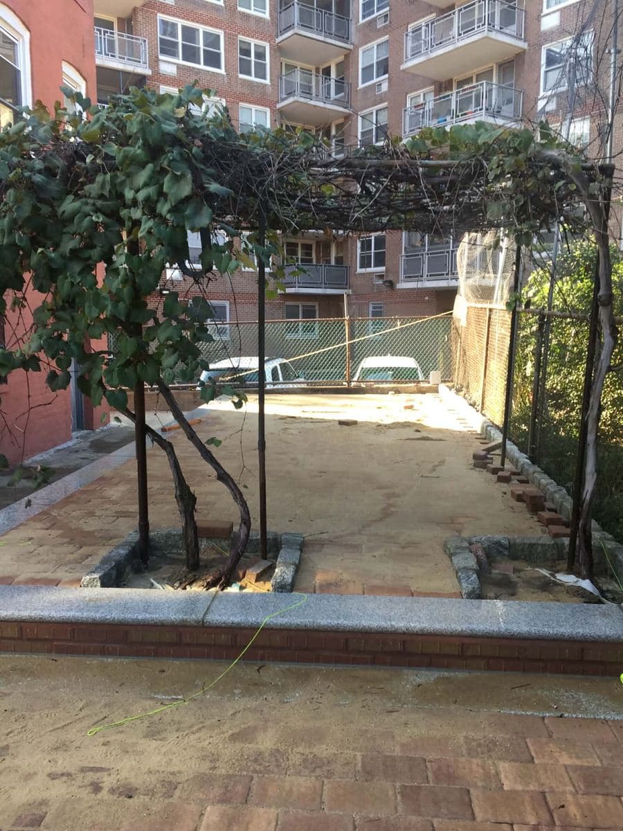 Backyard cleared and prepared before a new paver surface is installed
