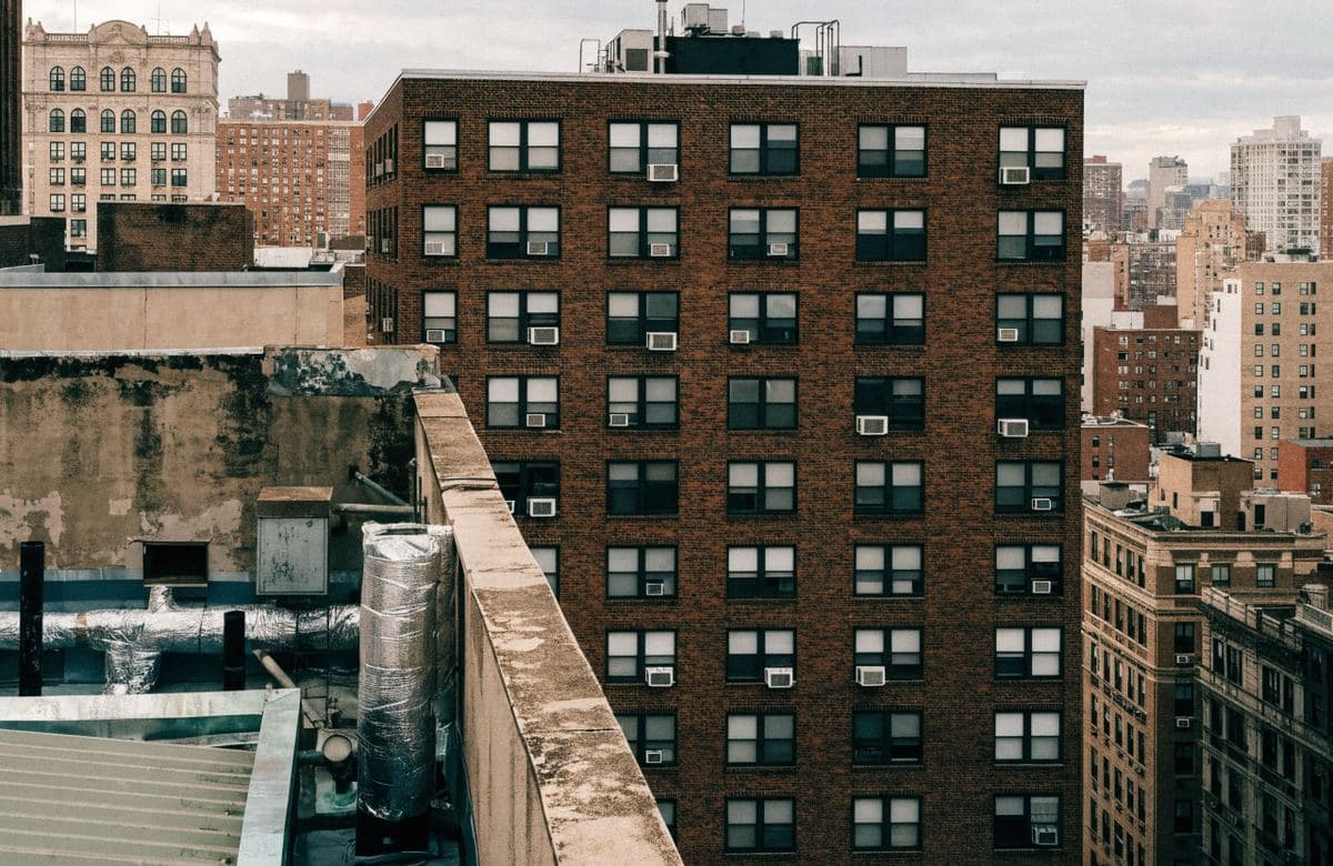 Illustrative tall apartment building with a large flat roof